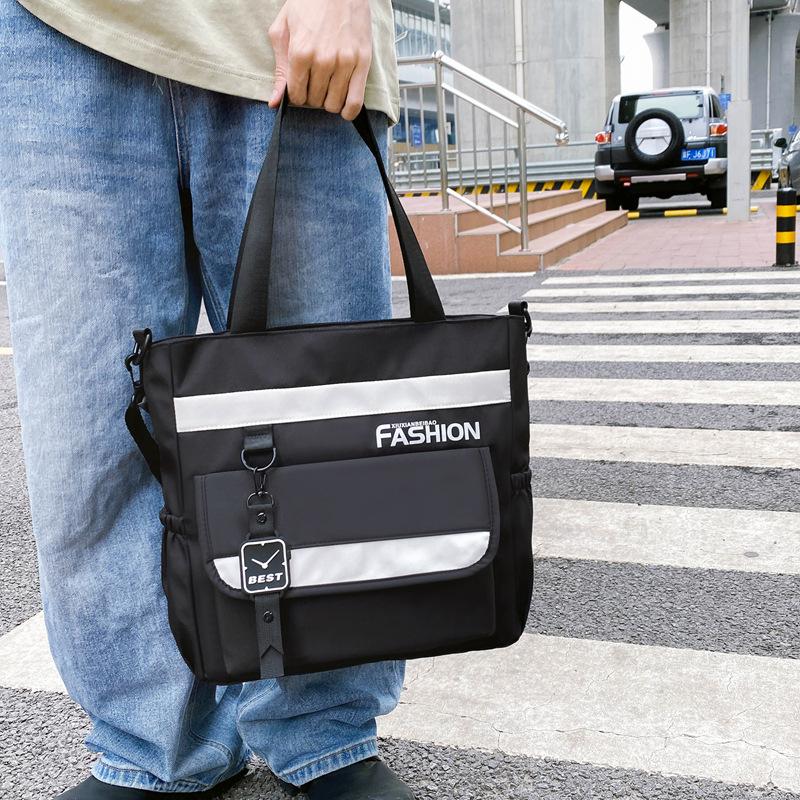 Eine Hand-Tragetasche mit großem Fassungsvermögen für Studenten, Eine leichte und leichte Umhängetasche für den Arbeitsweg