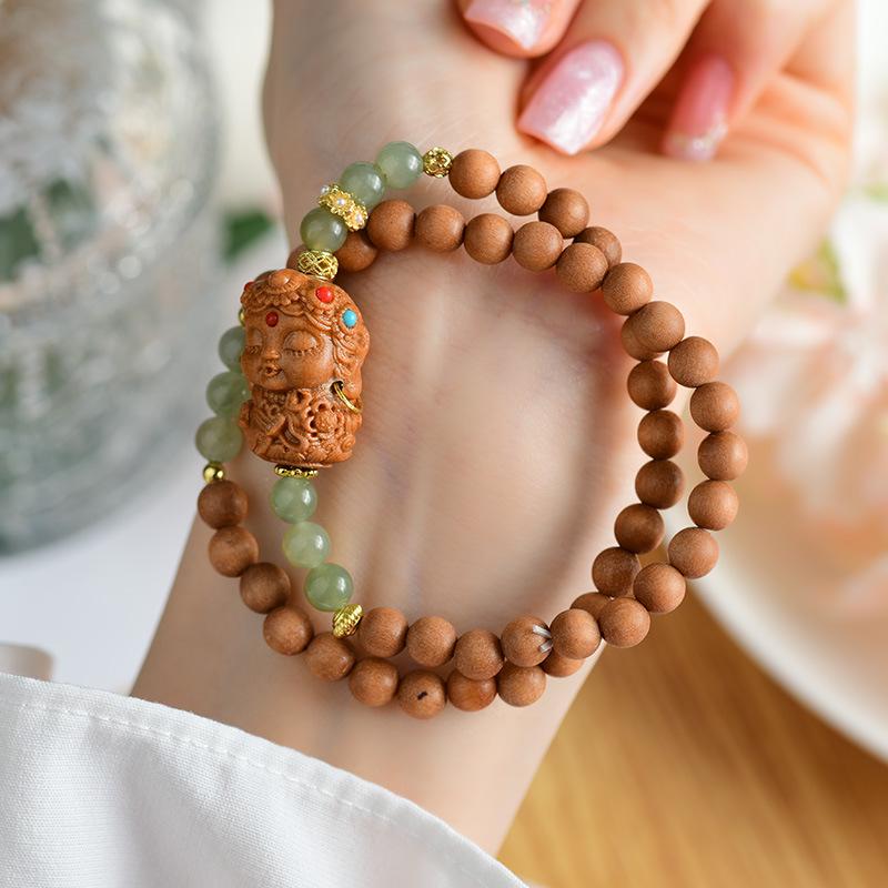 

Sandalwood Jade Tara Temple Souvenir Bracelet