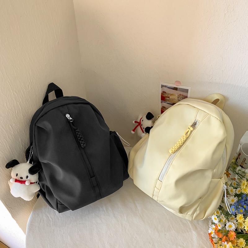 School bag female college students simple niche design sense backpack high value junior high school students leisure travel backpack