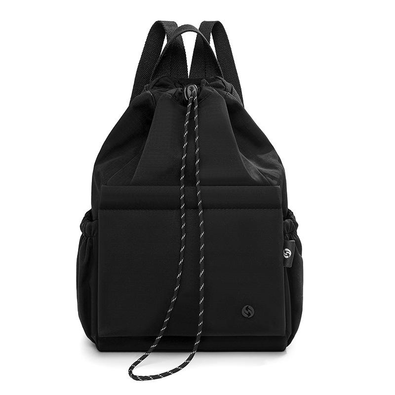 Schoolbag versatile backpack large-capacity design sense commuting travel large-capacity schoolbag waterproof and wear-resistant backpack wholesale