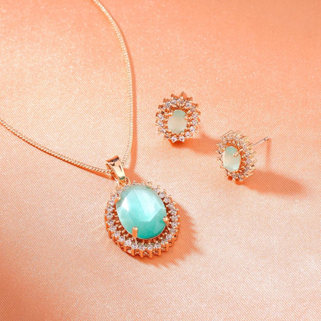 Hübscher runder Designer-Anhänger Estele mit Roségoldbeschichtung und mintgrün für Damen