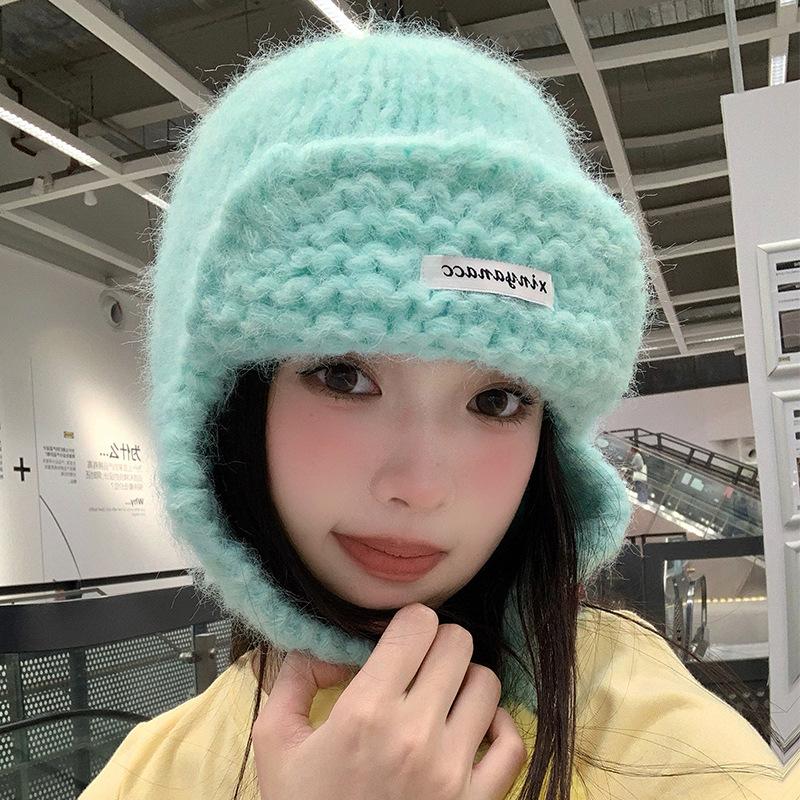 Cute green knitted hairball ear protection hat women's autumn and winter Korean flying hat wool hat warm Lei Feng hat tide