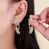 Elegant Zircon Bow Tassel Earrings – High-End Slimming Design