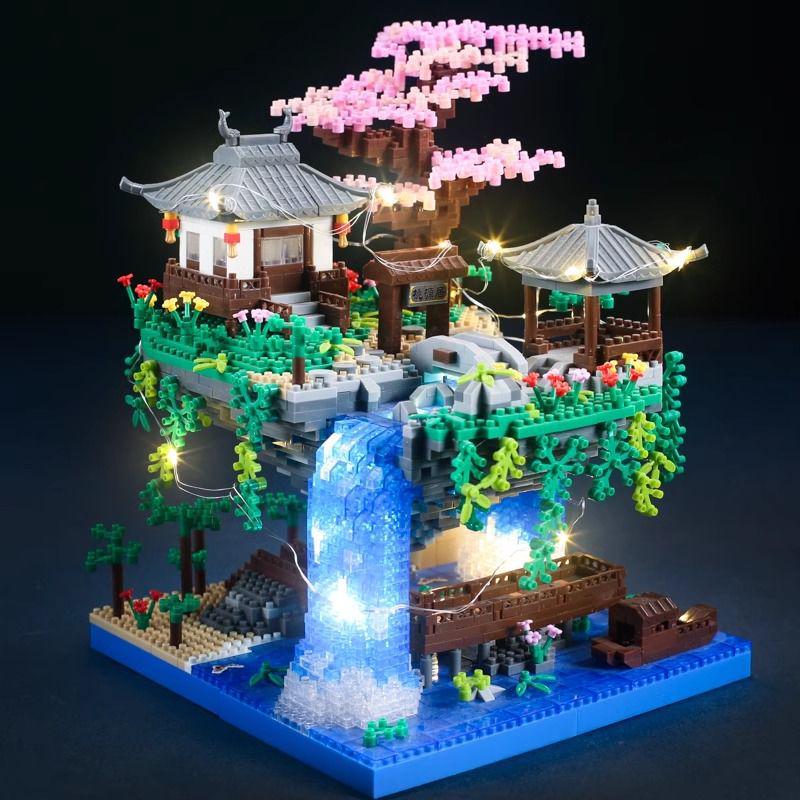 Fairy Pavilion Cherry Blossom Treehouse with Peach Blossom Pond - Creative Ancient Style Building Block Ornament, Handmade Assembly Scene.