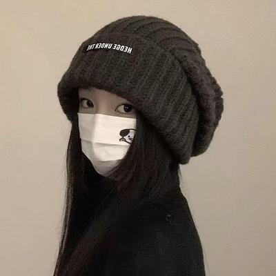 Women's Oversized Wool Beanie: Warm, Stylish, Knitted Hat with Ear Protection for Autumn & Winter.