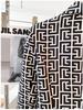 2025 European & American Celebrity Women's Slim Fit Double-Breasted Geometric Jacquard Suit Jacket with Lion Buttons.