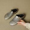 Design sense Roman woven hollow bag head cool slippers 2025 summer new wear round head thick heel muller shoes women