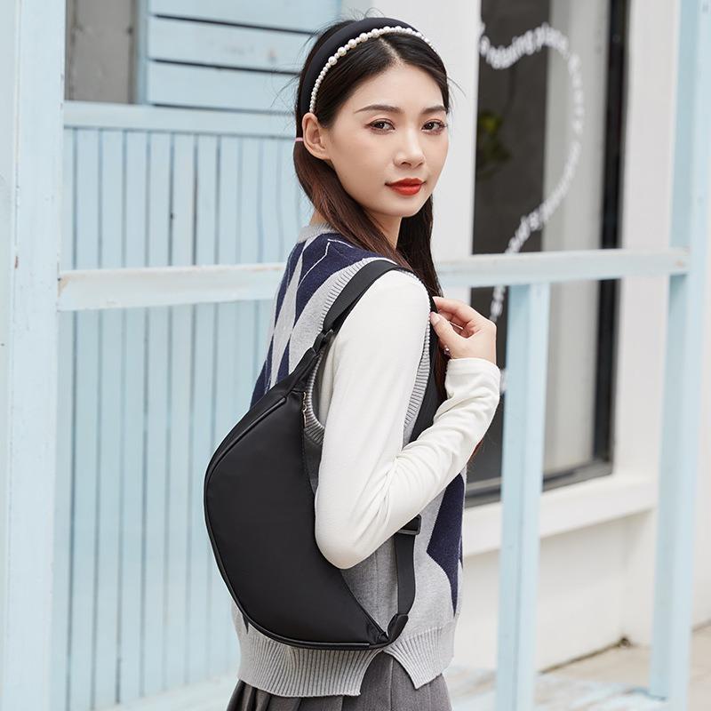 Simple and wide-brimmed new women's fanny pack versatile fashion single shoulder messenger casual women's bag