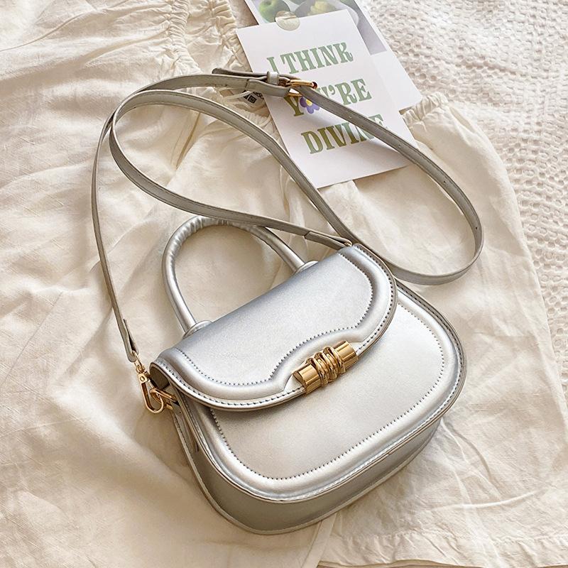 Einfache und stilvolle Handtasche mit Textur 2025 Frühling neue vielseitige Ins Schulter-Umhängetasche Satteltasche Damen