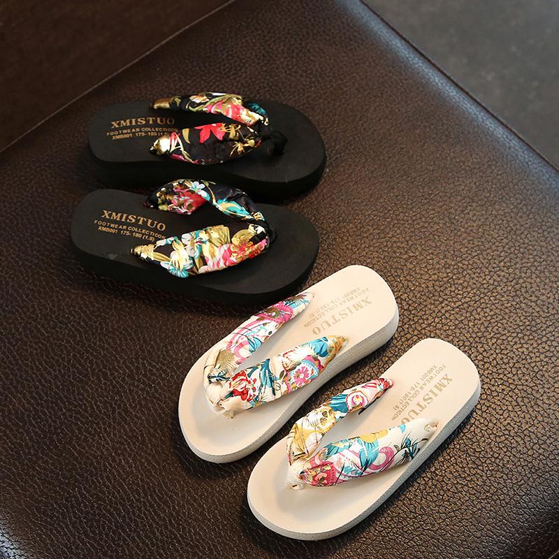 Korean version of summer's new bohemian satin wedge heel non-slip wedge heel pinch flip-flops beach women's cool slippers