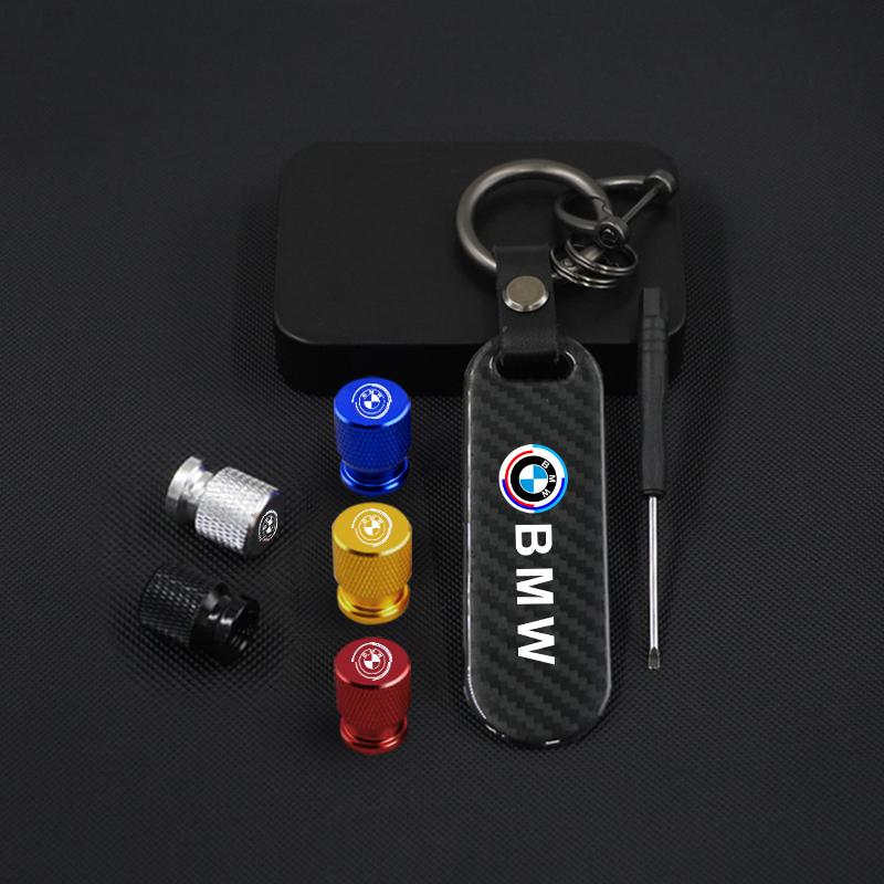 Carbon fiber Tire Valve Stems Cap Keychain Style Wheel Air Valve Cover For BMW 50th Anniversary 3 5 7 Series E83 F16 E70 Sticker GA3