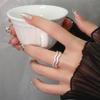 Double-Layer Zircon Ring with Geometric Texture and Full Diamond Water Wave Pattern