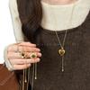 Winter and Autumn Vintage Tiger-eye Stone Heart-shaped Flower Pendant Pull Necklace for Elegant Women's Sweater Chain