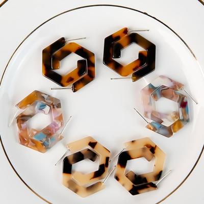Damers hexagonala öppna C Hopi silvernålörhängen