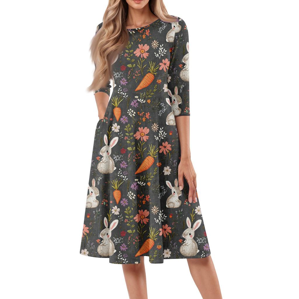 Dámské volné ležérní a módní šaty střední délky s potiskem, kulatým výstřihem a sedmčtvrtečními rukávy