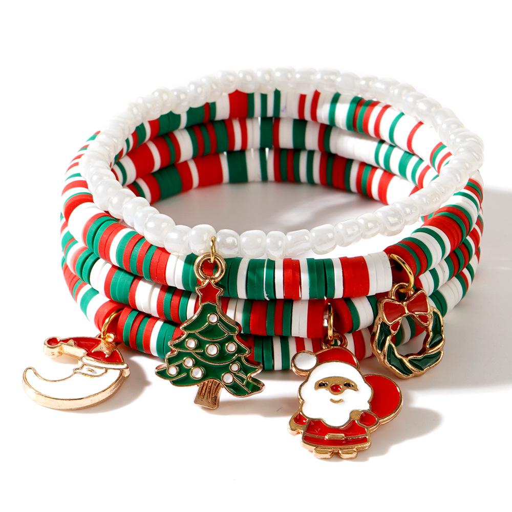 

Праздничная серия: Набор украшений из полимерной глины «Санта и снеговик» (Подвеска-перчатки и браслет)