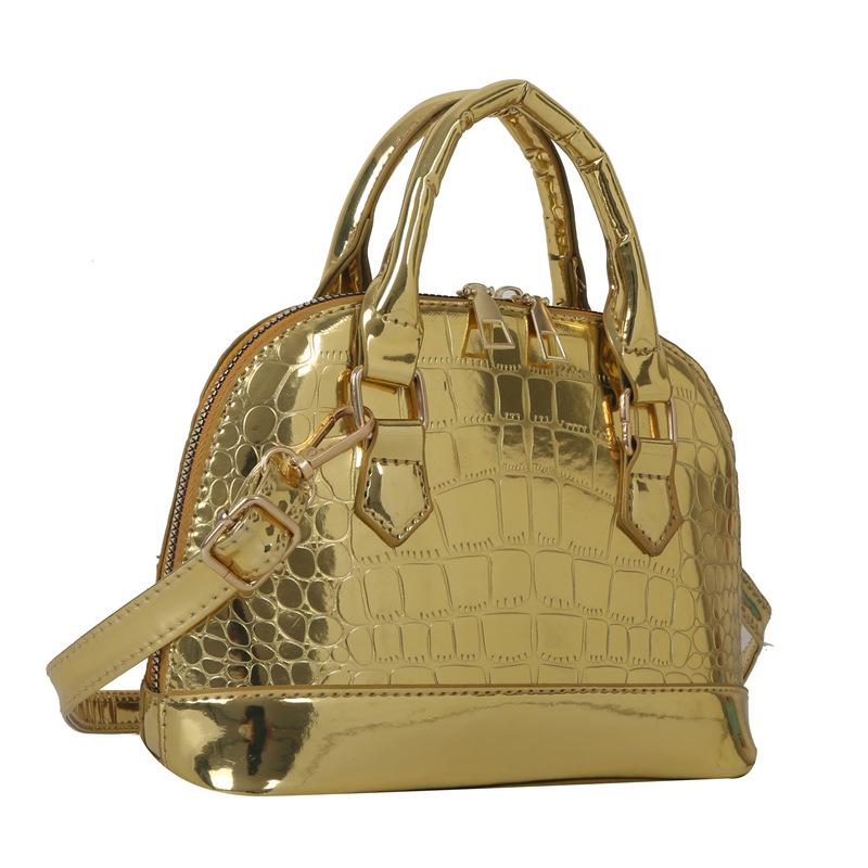 

Solid color glossy messenger small bag women s 2024 new high-end versatile niche patent leather shoulder portable shell bag золотий