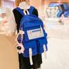 Skolesekk Kvinnelige ungdomsskoleelever Enkel ryggsekk med stor kapasitet Ny reise vanntett ryggsekk Videregående skoleelever Trendy merkevare
