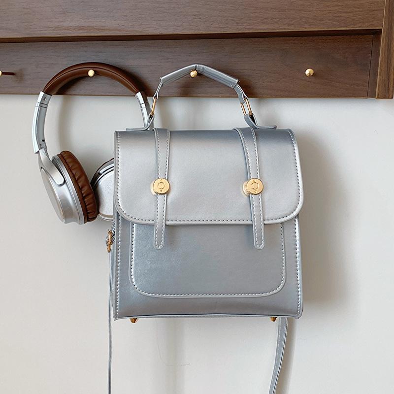 

Large capacity fashion college style simple temperament 2025 autumn new foreign style casual women s shoulder backpack срібний