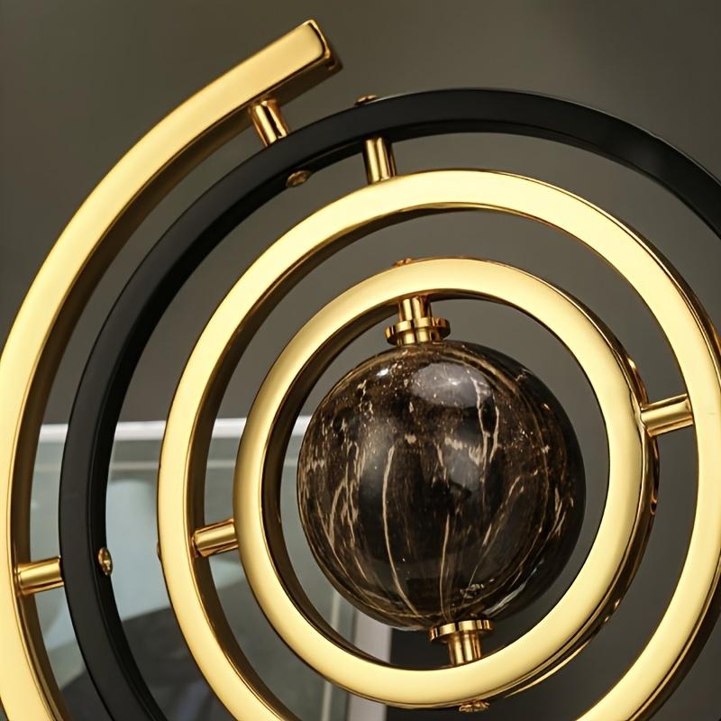 360-Degree Rotating Modern Abstract Metal Globe Sculpture with Rectangular Stand - Black & Golden Art Decor for Home or Office