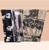 Mom's Summer Floral High-Waist Nine-Point Pants for Middle-Aged and Elderly Women - Elastic, Loose, and Casual Fit.