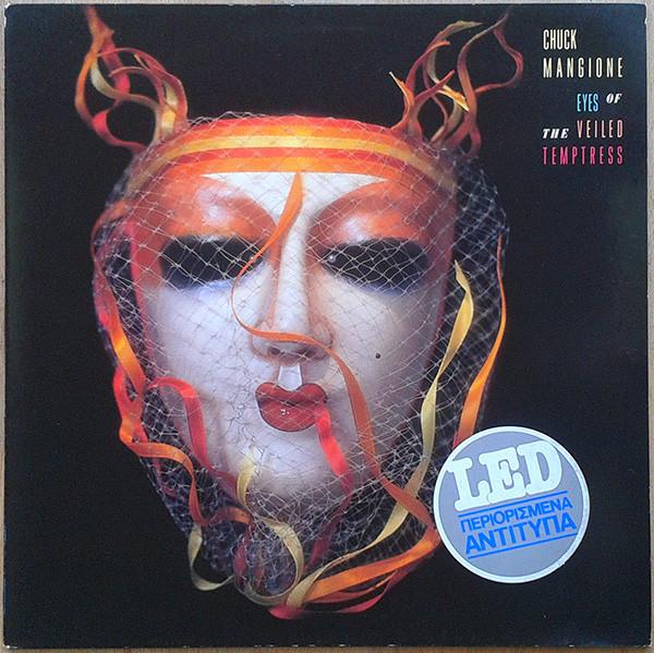 

LP Record CHUCK MANGIONE Eyes Of The Veiled Temptress CBS4611621 CBS 1988 Greece Jazz Used