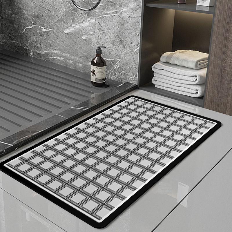 

Белая ванная комната Ванная комната Технология мгновенного высыхания и впитывания Кожаный коврик для пола Нескользящий коврик для ног Мягкая диатомовая грязь 40*60