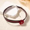 Koreansk version av det nya Ankola röda nischiga enkla mode designkänsla konstläder handvävd blomhalsband