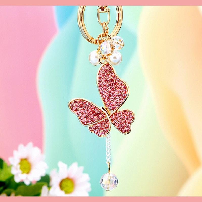 Cute Pearl Adorned Keychain With Vibrant Butterfly Design Ideal For Gift Giving Occasions
