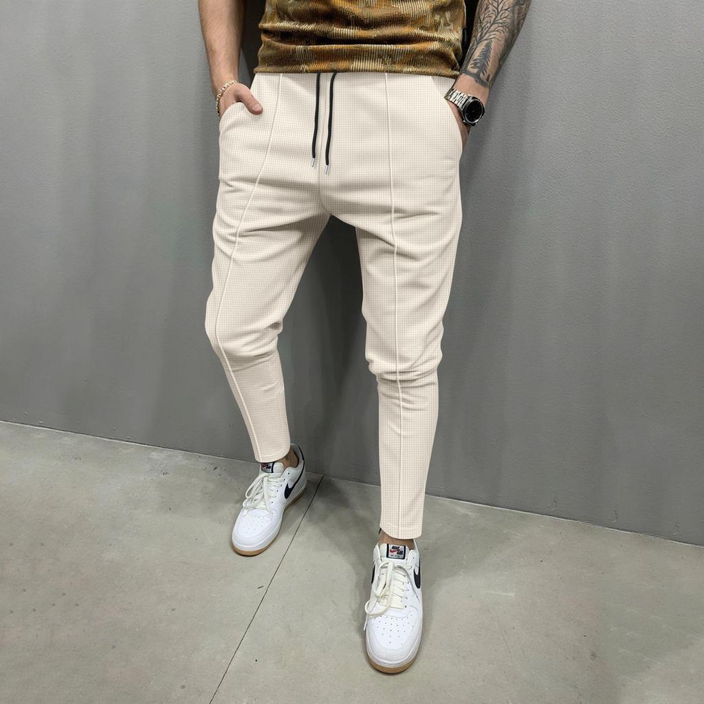 Four Seasons Men's New Solid Color Tethered Trousers Loose Casual Sports Elastic Waist Straight Pants