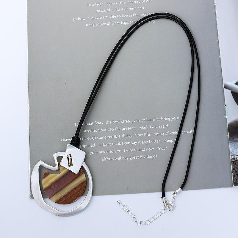 New women's necklace long high fashion retro personality trend pendant European and American