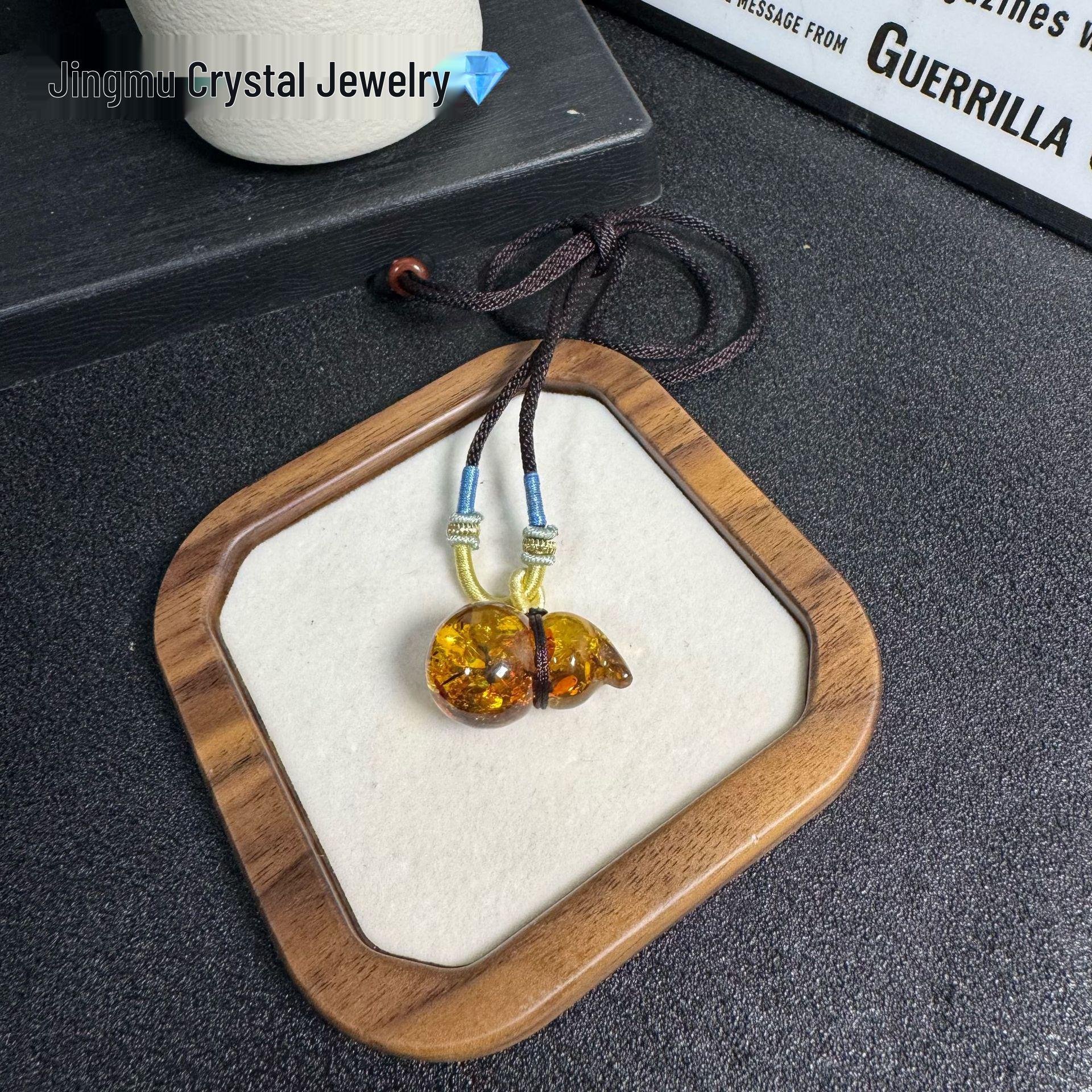 

Natural Amber Flower Gourd Pendant One Size