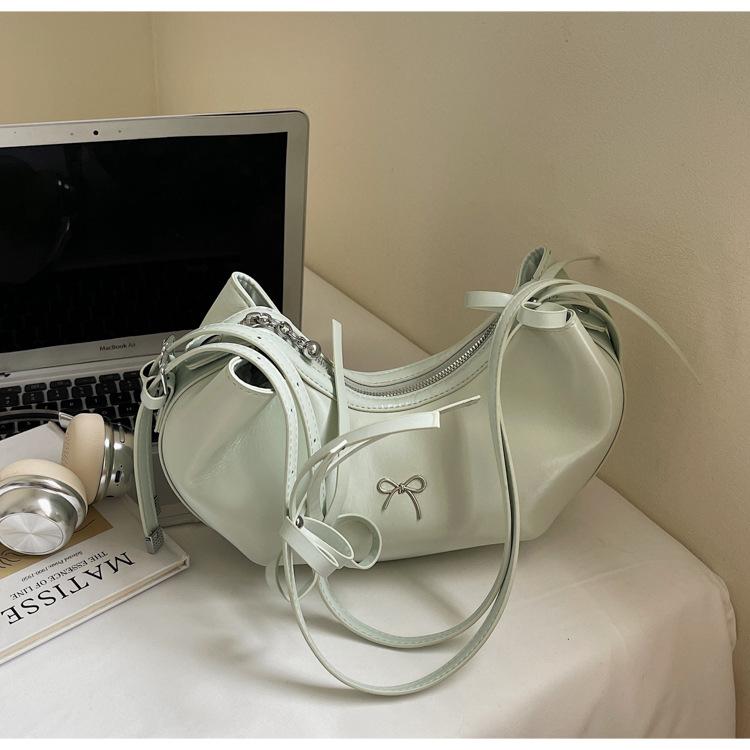 

French oil wax leather shoulder armpit bag women 2025 new niche design retro messenger bag fashion dumpling bag tide зелёный