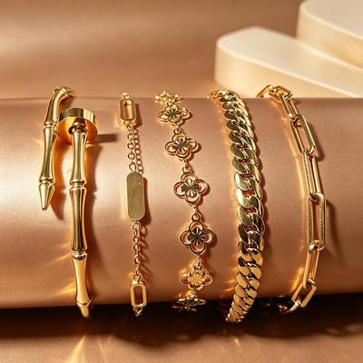 European & American Light Luxury Gold-Plated Titanium Bracelet Set: Bamboo Joint, Four-Leaf Clover, Cuban Chain Design for Women