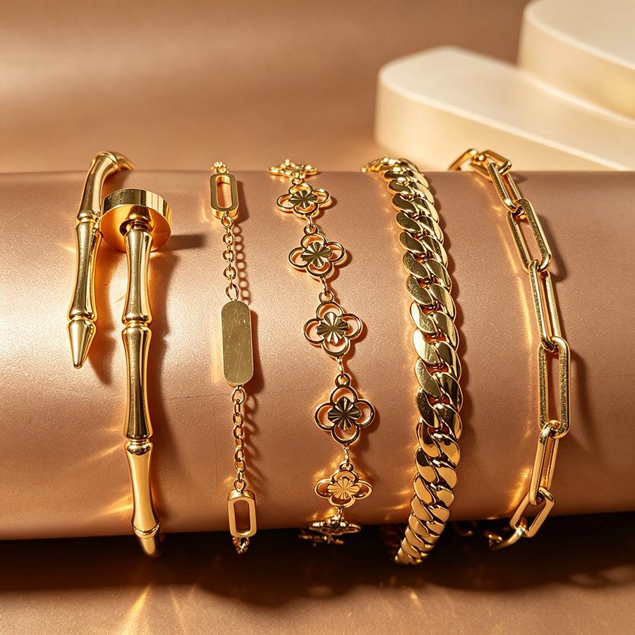 European & American Light Luxury Gold-Plated Titanium Bracelet Set: Bamboo Joint, Four-Leaf Clover, Cuban Chain Design for Women