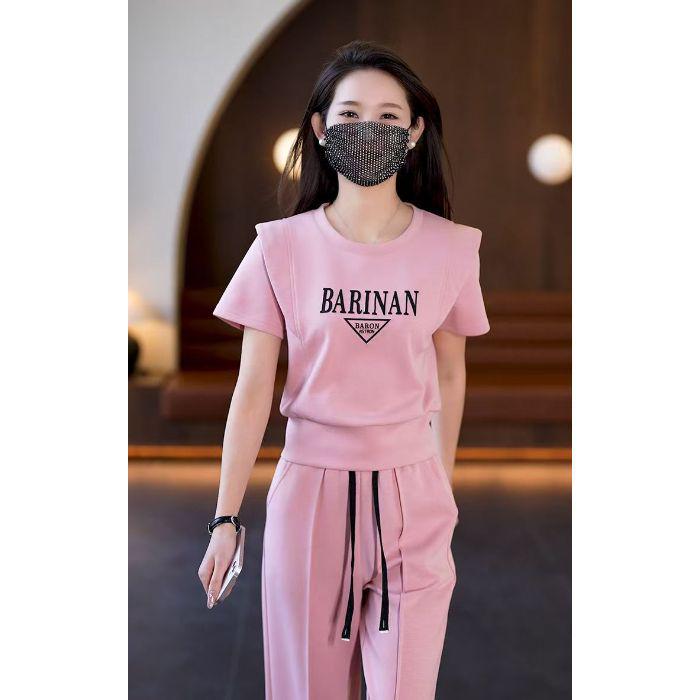 

Женский модный летний комплект из двух предметов с коротким рукавом и брюками широкого кроя 2025 - Стильная и омолаживающая спортивная одежда L [suggested 100-110 jin] розовый