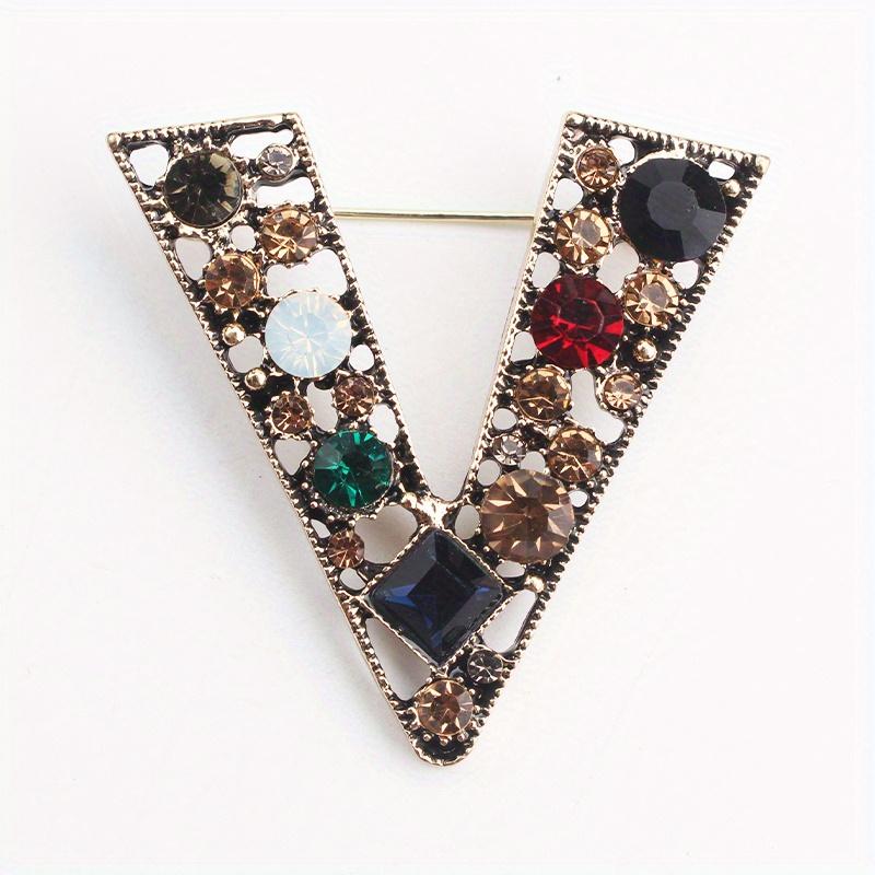 Retro temperament design sense hollow victory V-shaped brooch