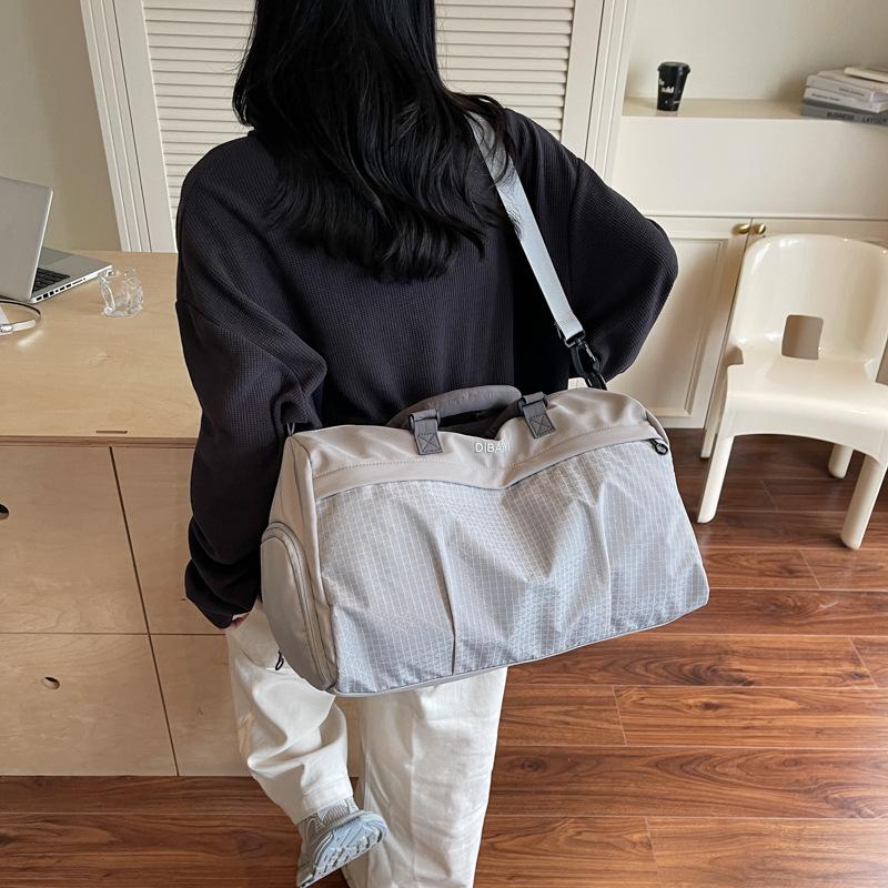 multifunctional crossbody travel bag - perfect for short trips, sports, fitness, and business travel. large capacity handbag/carry-on duffel bag