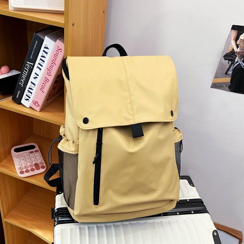 Schoolbag backpack women's new large-capacity solid color simple leisure college wind backpack trend flip student class schoolbag