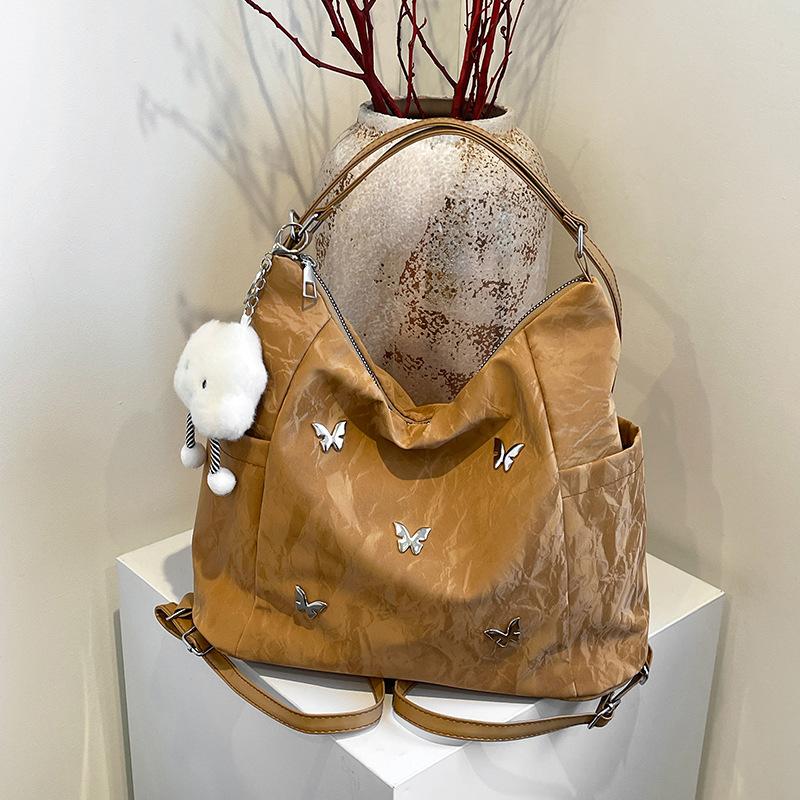 

Заклепка Бабочка Большая Вместимость 2025 Новый Дизайн Чувство Индивидуальности Дизайн Двойной Рюкзак Многофункциональная Наплечная Сумка Кроссбоди single package коричневый