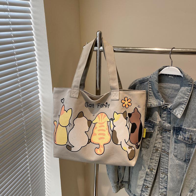 Cartoon cute tote bag women's new versatile canvas shoulder bag large-capacity class commuter bag