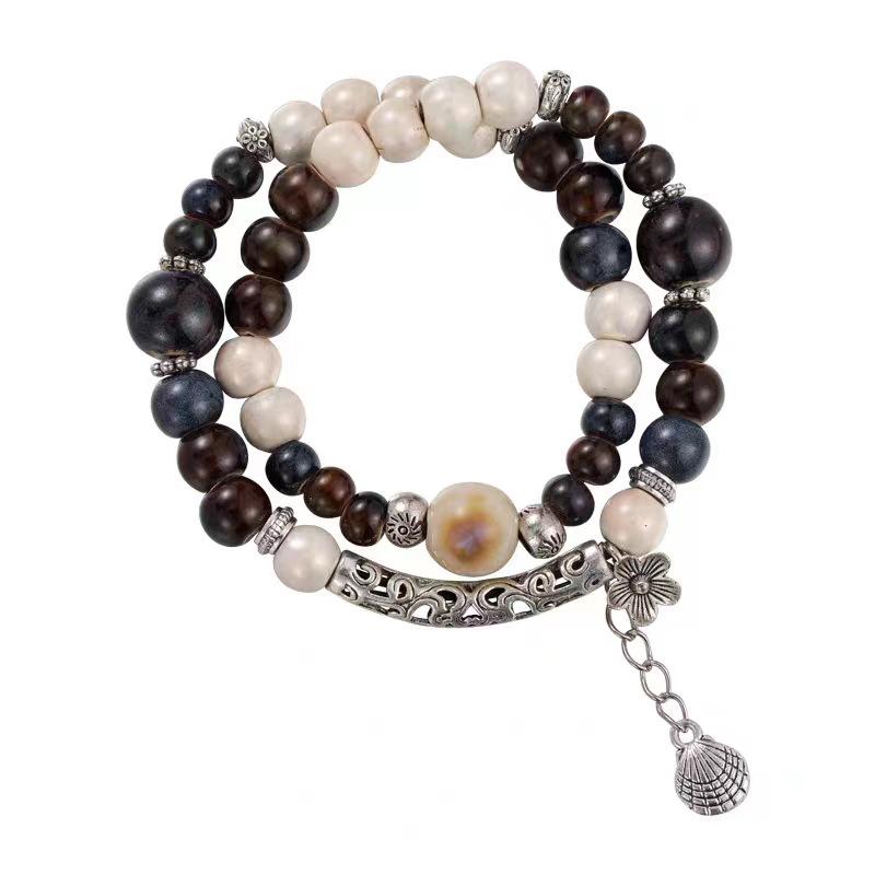 Keramikperlenarmband für Damen, Ethno- und Exotik-Stil, elastisches Seil, chinesisch inspiriertes Design