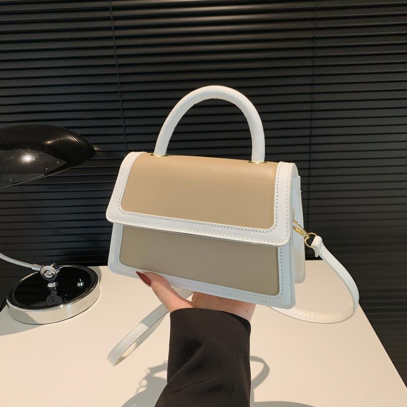Splicing color clamshell type casual summer new simple Korean version fashionable foreign style women's hand carry shoulder small square bag soft