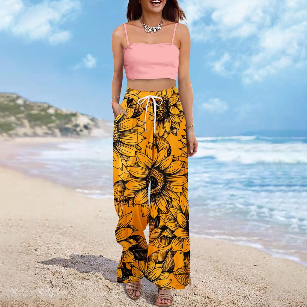 Pantaloni palazzo estivi da donna, stile boho, a vita alta, larghi, con stampa floreale e tasche.