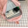 Large-capacity simple casual backpack, male and female high school students, high school students, schoolbags, multi-compartment fashion backpacks