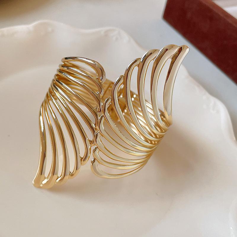 

Европейский и американский крылатый полый браслет-манжета - Высококлассный модный эффектный браслет для женщин