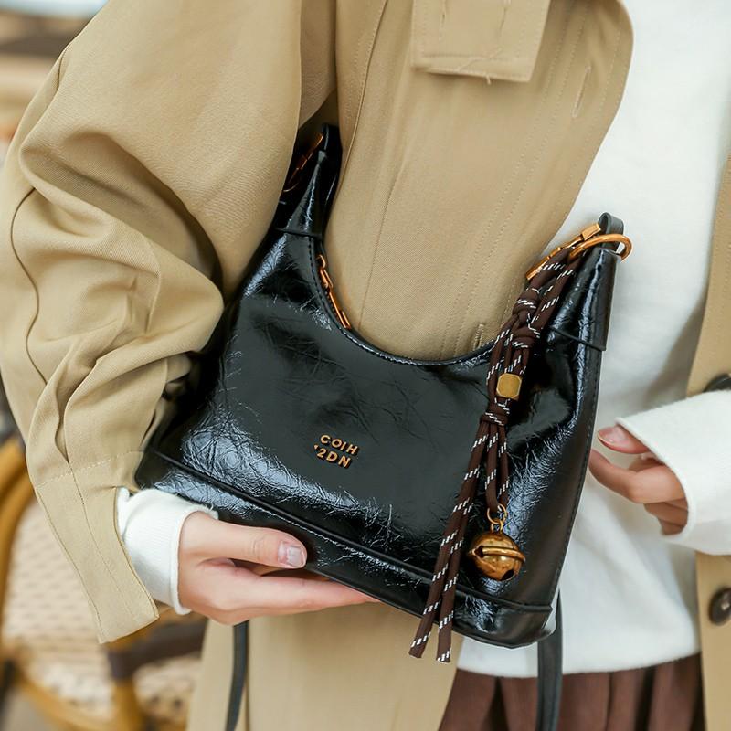 Faux Leather Hobo Bag for Women Fashion Shoulder Bag with Gold Hardware and Tassel Charm Elegant Everyday Handbag