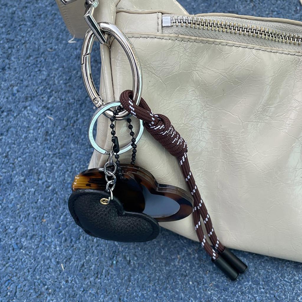 Kreative Designs Multifunktionaler Schlüsselanhänger Kamm Spiegel Tragbares Haarwerkzeug und Kosmetikzubehör für den täglichen Gebrauch