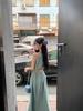 Black waist-exposed holiday dress, new design sense, waist-closed and thin, sleeveless neck-hanging long dress for women in summer