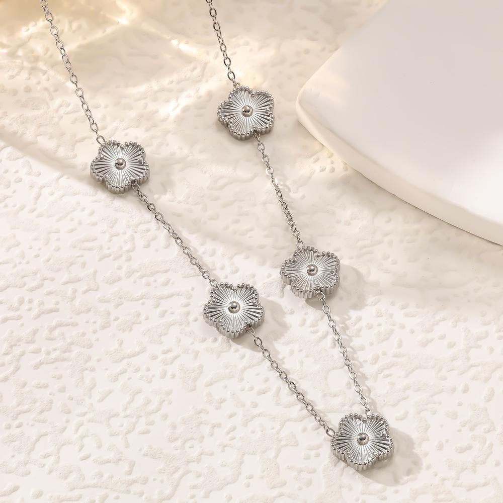 Versatile Trendy Set: Five-Petal Flower & Four-Leaf Clover Jewelry in Laser-Cut Titanium Steel
